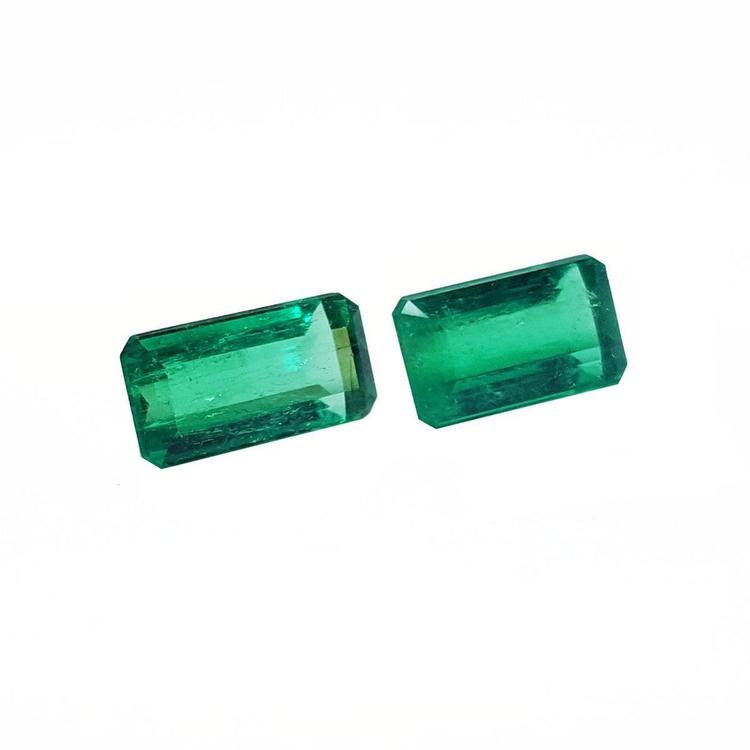 Matched pair of 2.08 ct. natural emerald-cut green emeralds from Muzo mines.