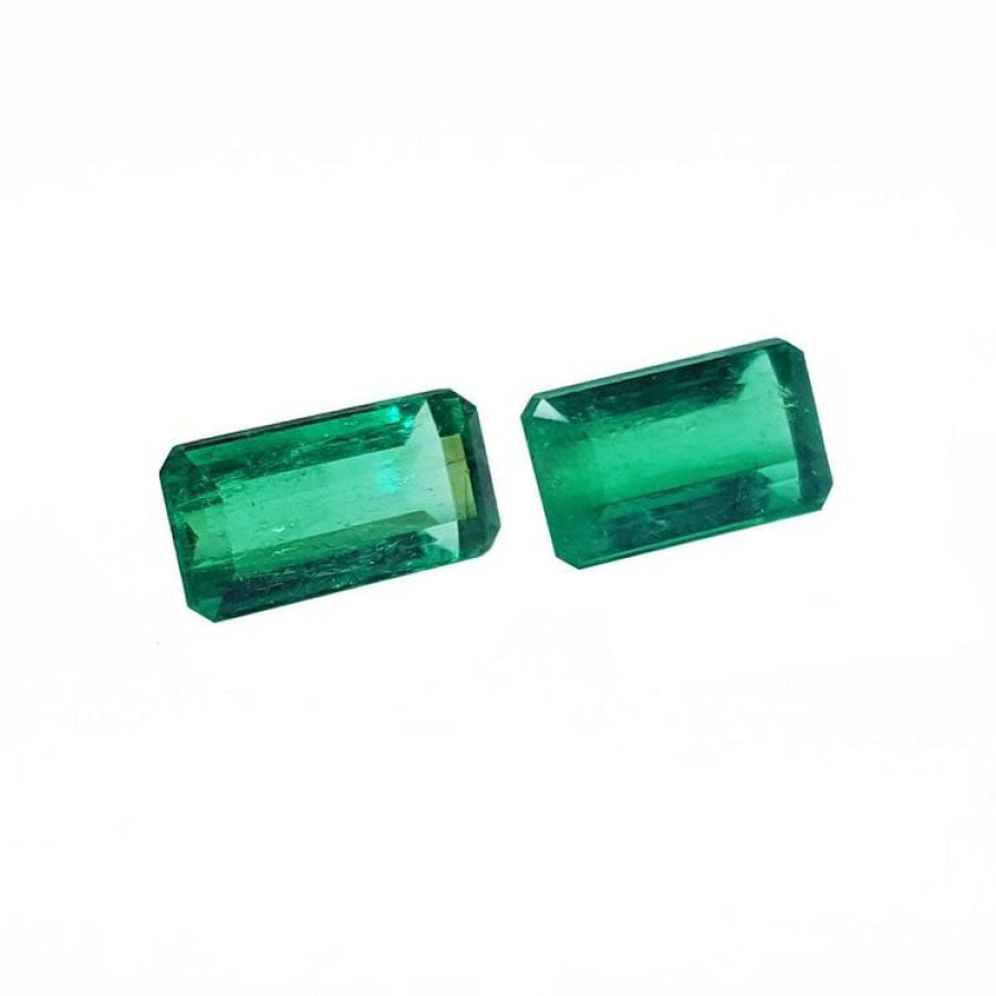 Matched pair of 2.08 ct. natural emerald-cut green emeralds from Muzo mines.