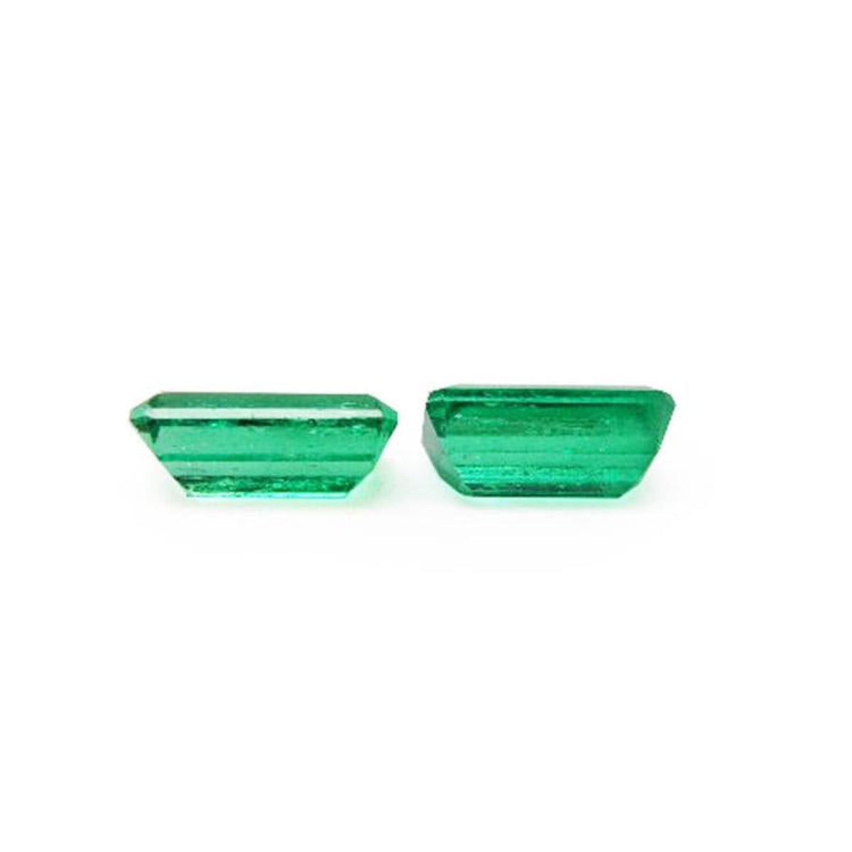 Matched pair of 2.08 ct. natural emerald-cut green emeralds from Muzo mines.