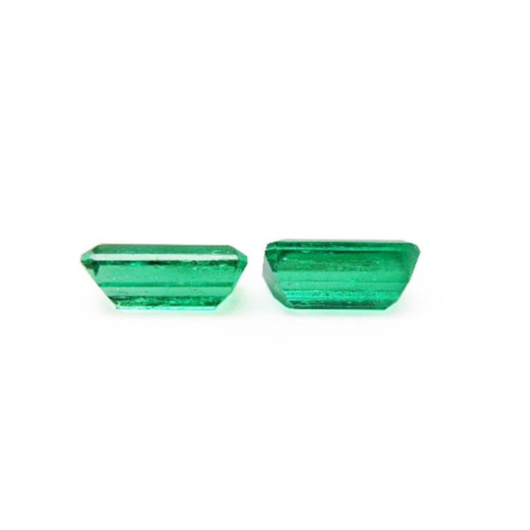 Matched pair of 2.08 ct. natural emerald-cut green emeralds from Muzo mines.