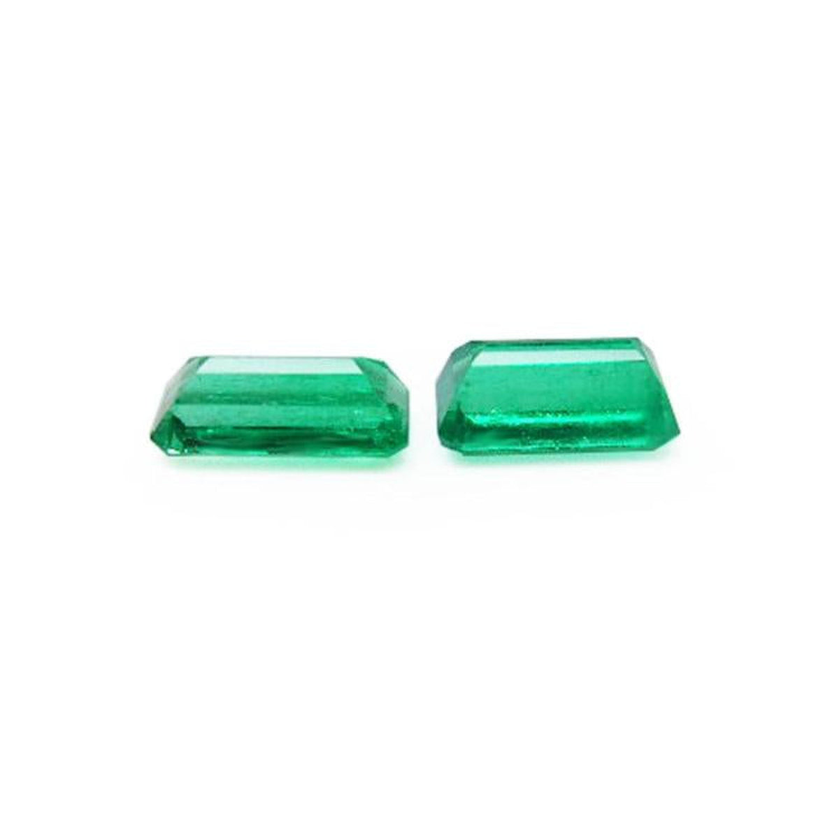 Matched pair of 2.08 ct. natural emerald-cut green emeralds from Muzo mines.