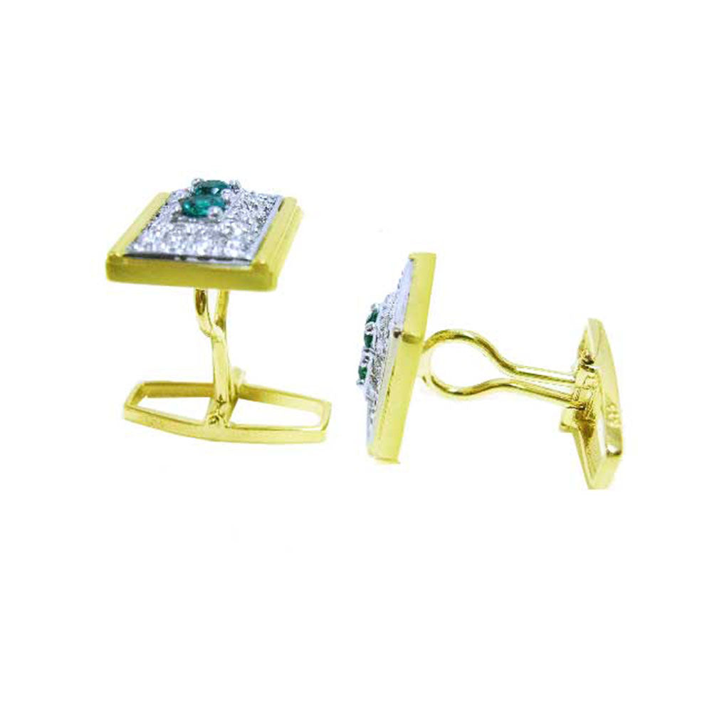 The lateral view of a pair of yellow gold cufflinks with genuine emeralds and diamonds.