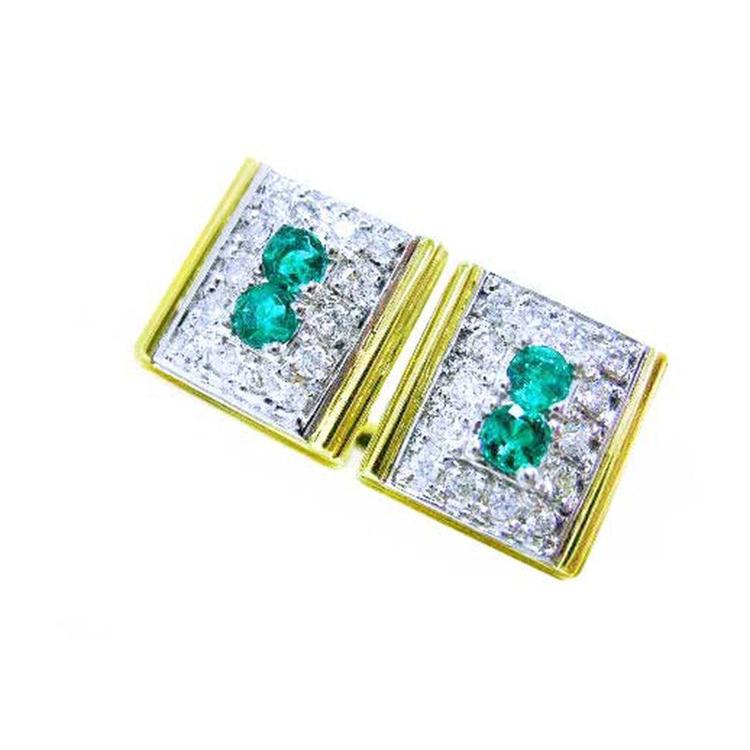 Two yellow and white gold cufflinks with emeralds and diamonds on a white background.