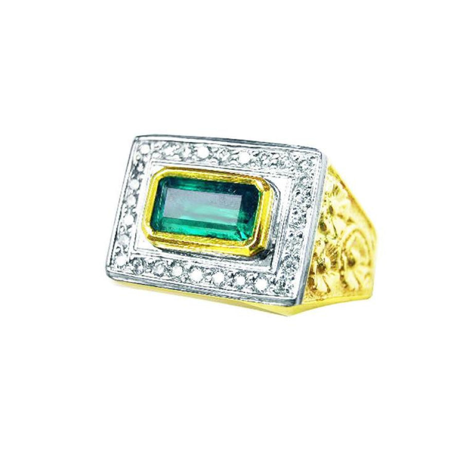 Men's 14K yellow gold ring with a rectangular bezel-set emerald surrounded by prong-set diamonds.