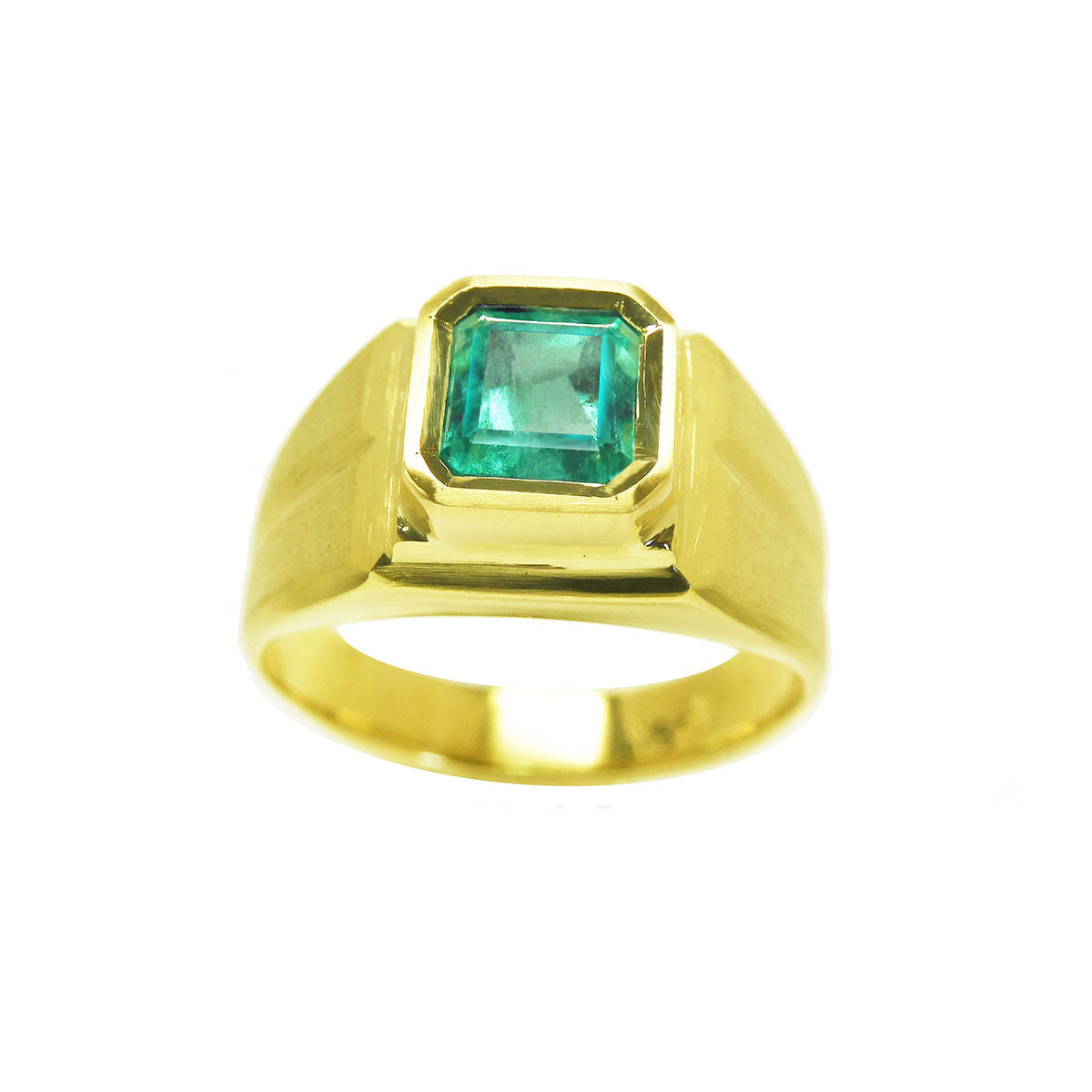 Gold emerald pinky ring for men on a white background.