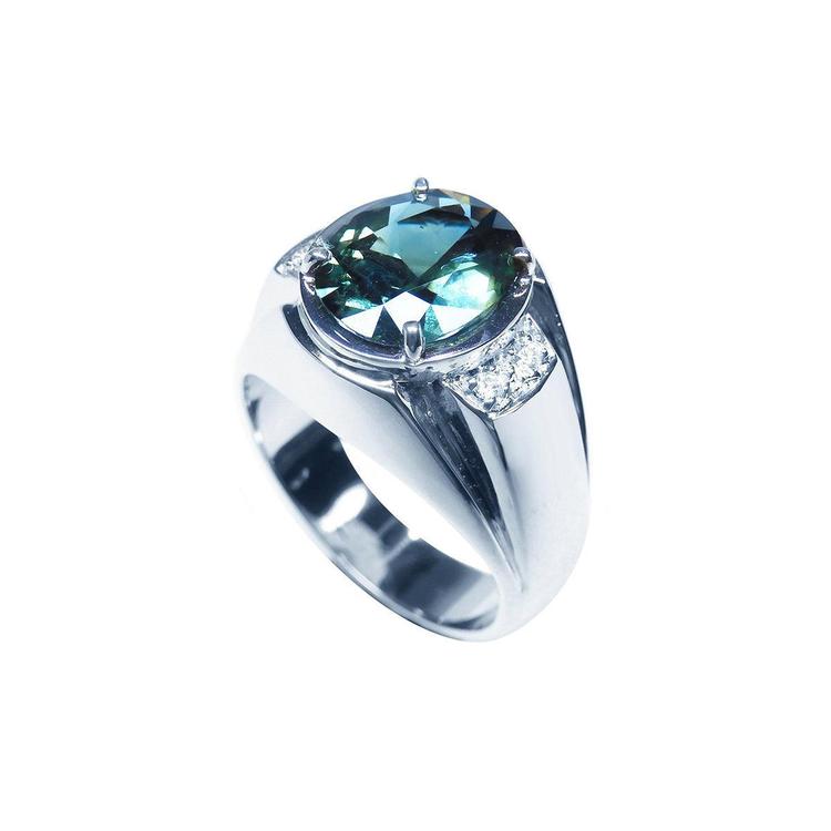 Men's 14K white gold ring with a large oval-cut greenish-blue sapphire and diamond accents.