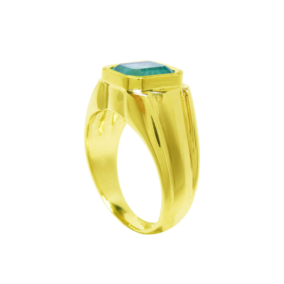 Gold ring for men with a natural emerald on half side position displaying top setting and partial lateral and side view.