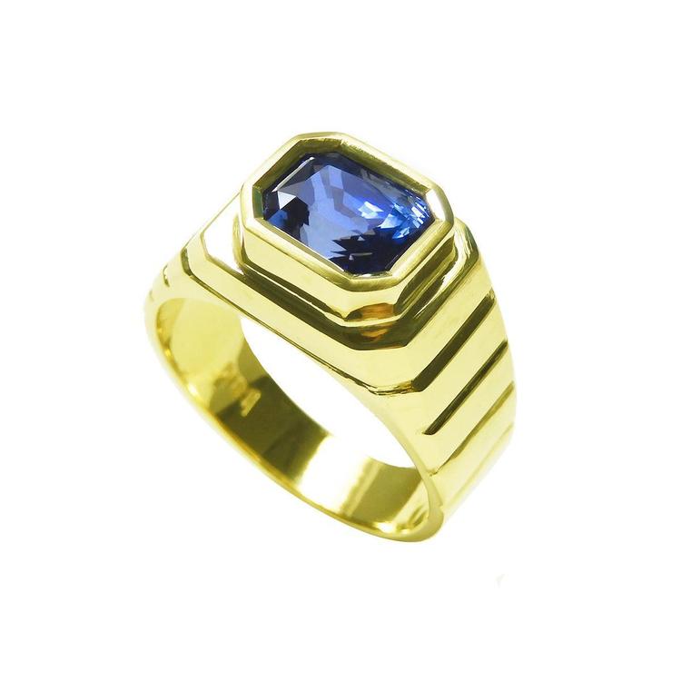 Men's natural sapphire solitaire ring bezel set crafted in 18k yellow gold, top and half side view