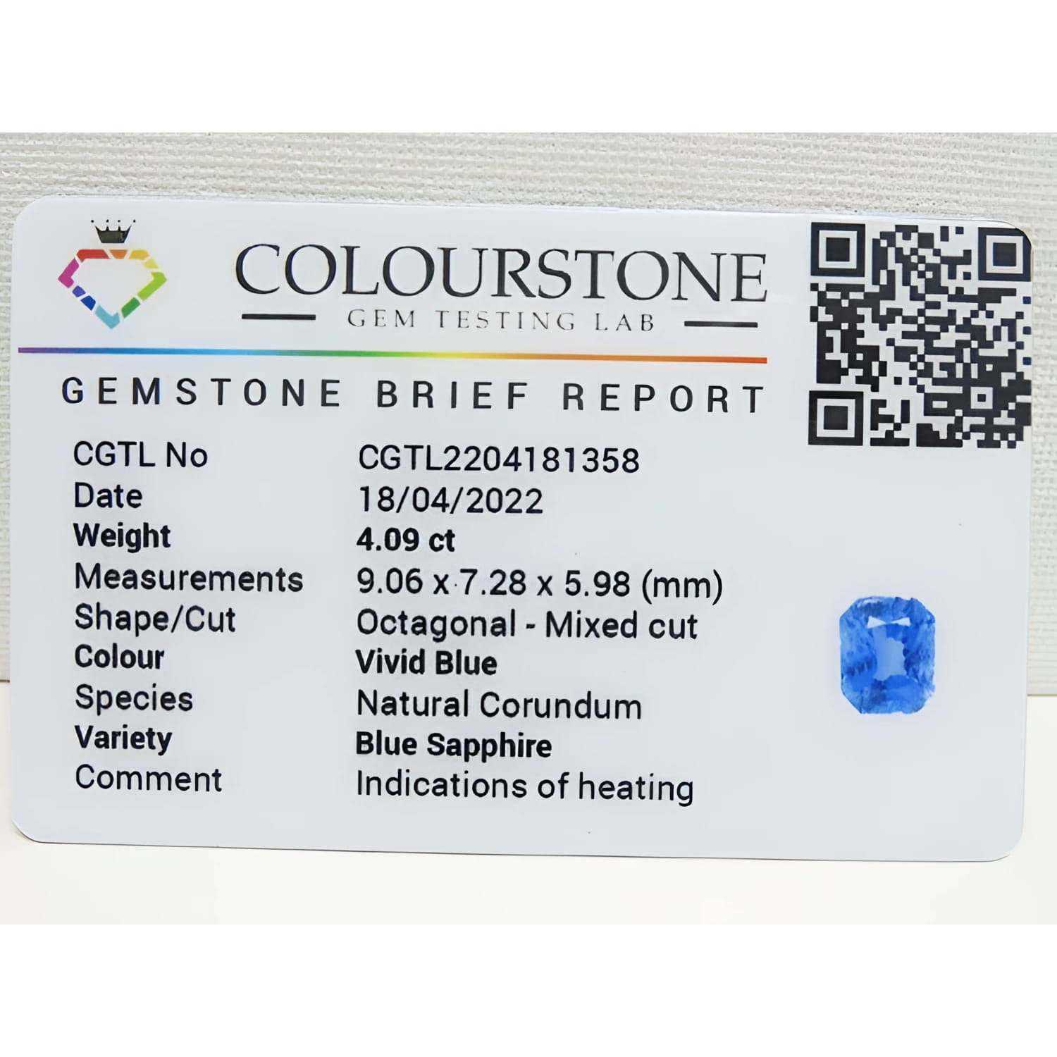 Colourstone Gemstone Brief Report for a vivid blue, octagonal-mixed cut sapphire.