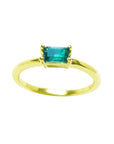 This minimalist solitaire natural colombian emerald ring prong set is made of 14k yellow gold.