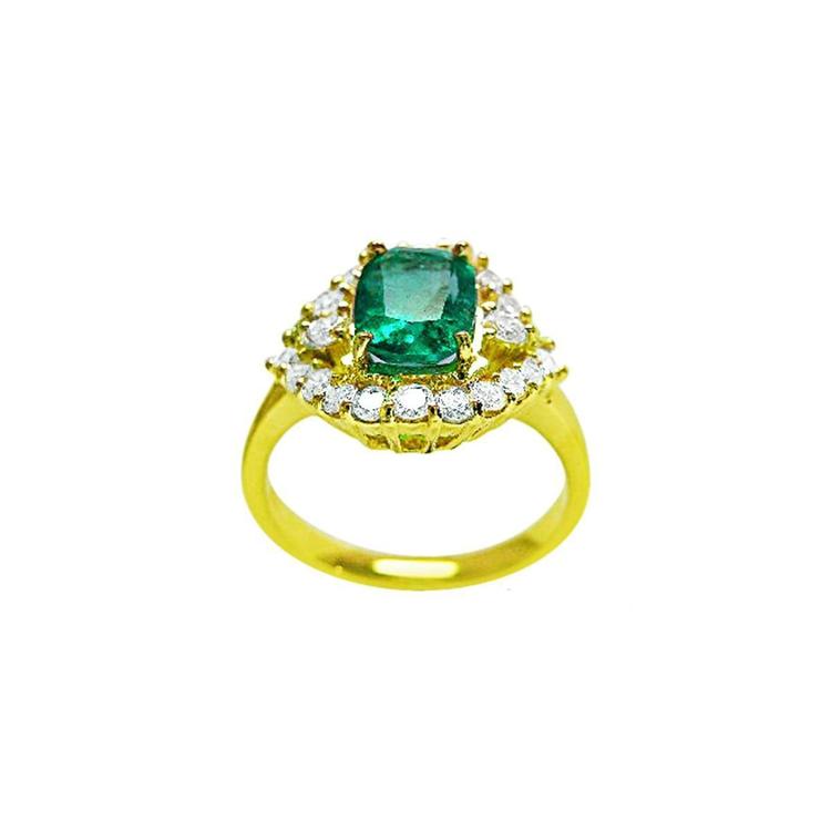 1.43 ct cushion-cut Muzo Colombian emerald ring with marquise diamond halo in 14K yellow gold.