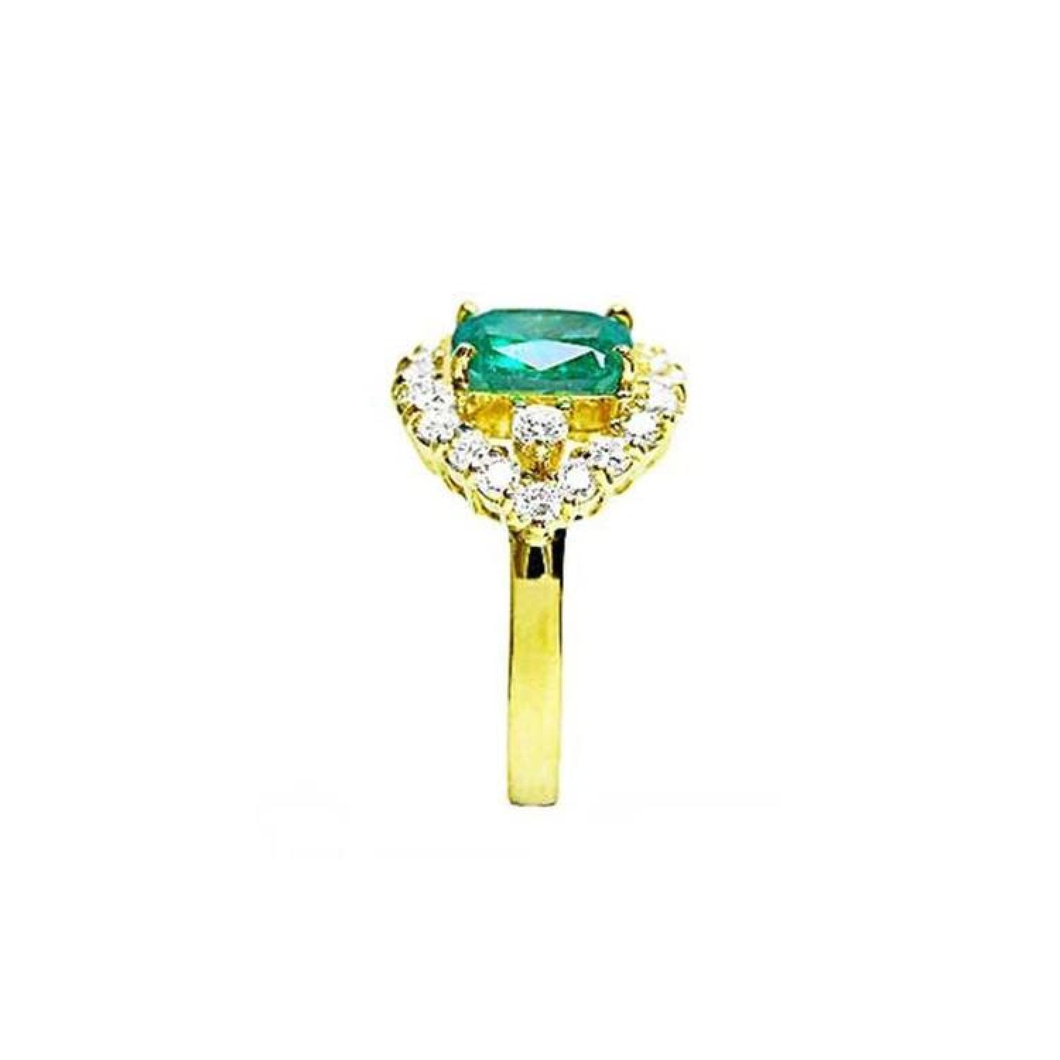 1.43 ct cushion-cut Muzo Colombian emerald ring with marquise diamond halo in 14K yellow gold.