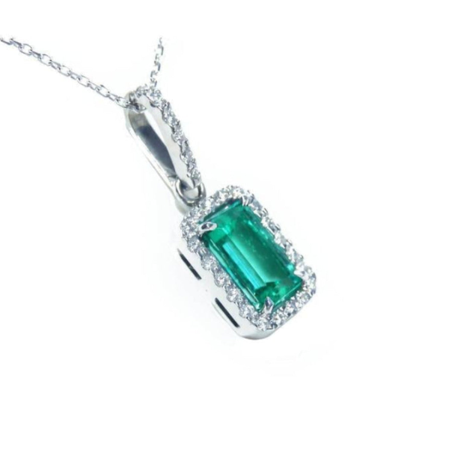This Colombian emerald pendant with a halo diamond was made of 18k white gold.