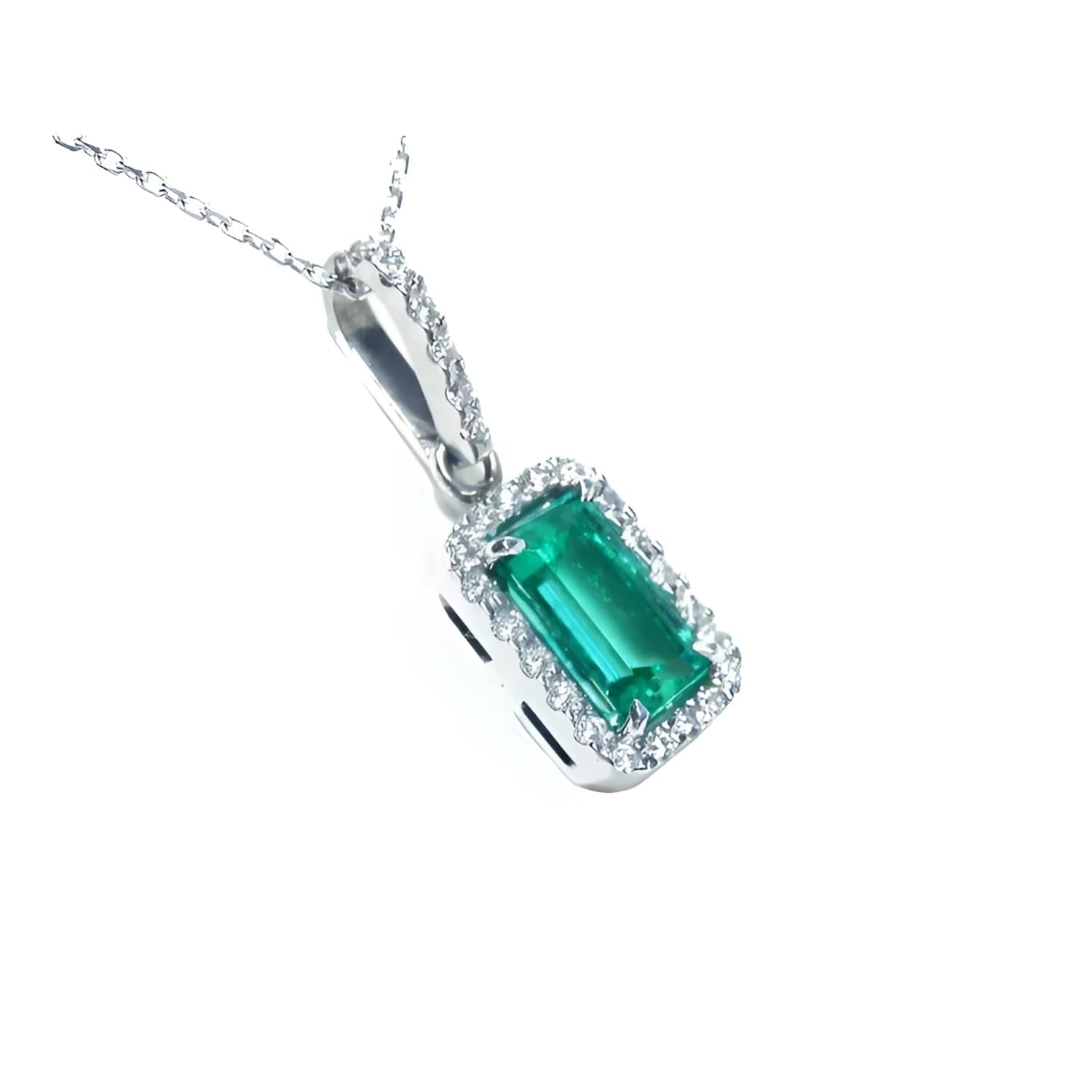 The right profile of this Colombian emerald pendant displays the topside and gallery profile.