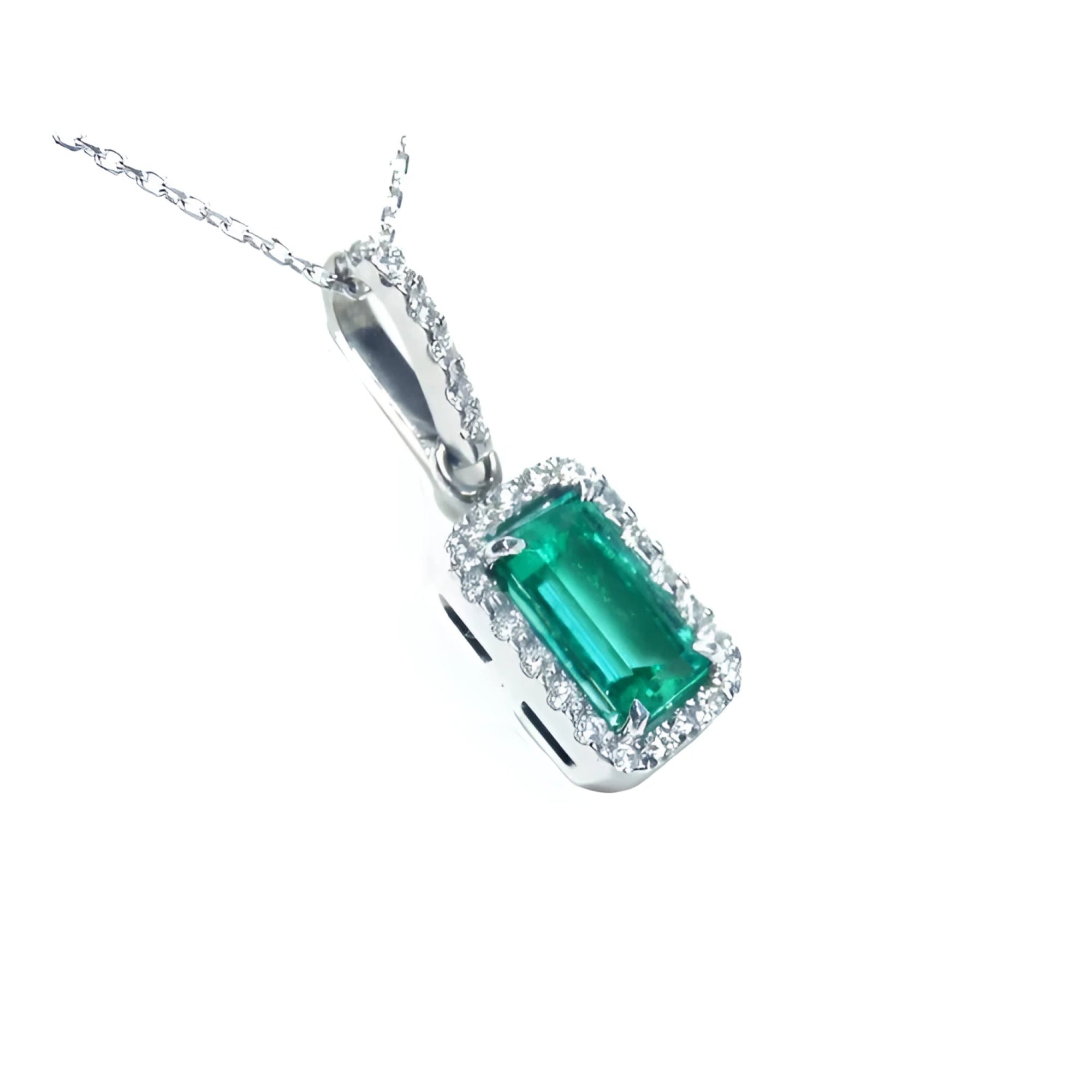 The right profile of this Colombian emerald pendant displays the topside and gallery profile.