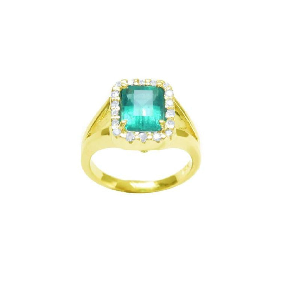 1.68 ct emerald-cut Muzo Colombian emerald ring with diamond halo and split shank in 14k yellow gold.