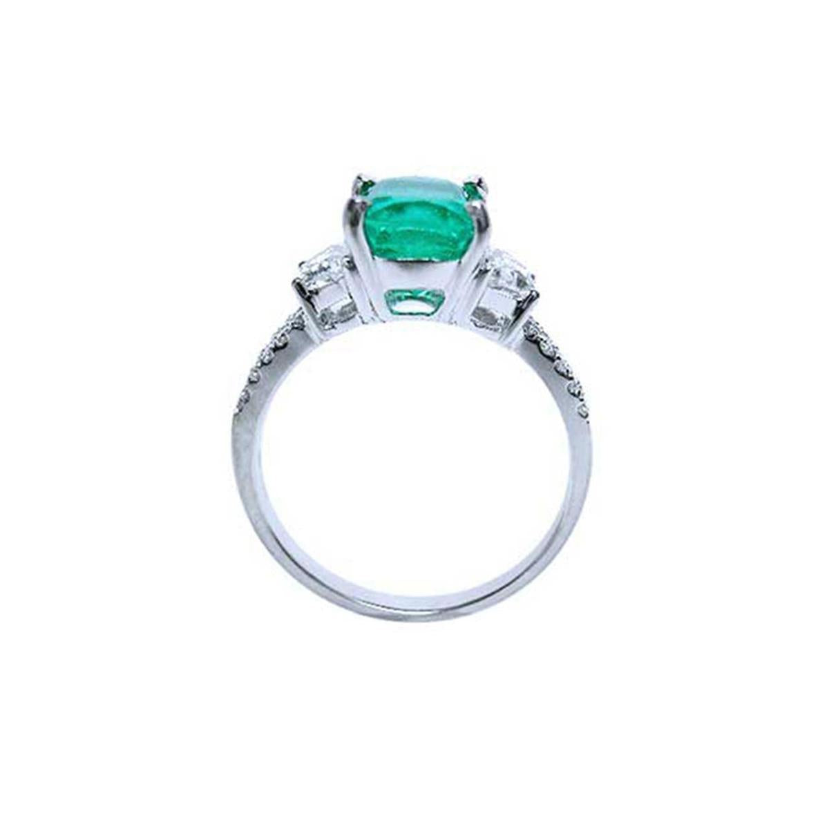 This Cushion cut Muzo mine Colombia emerald ring for women is on a lateral position top and gallery view.