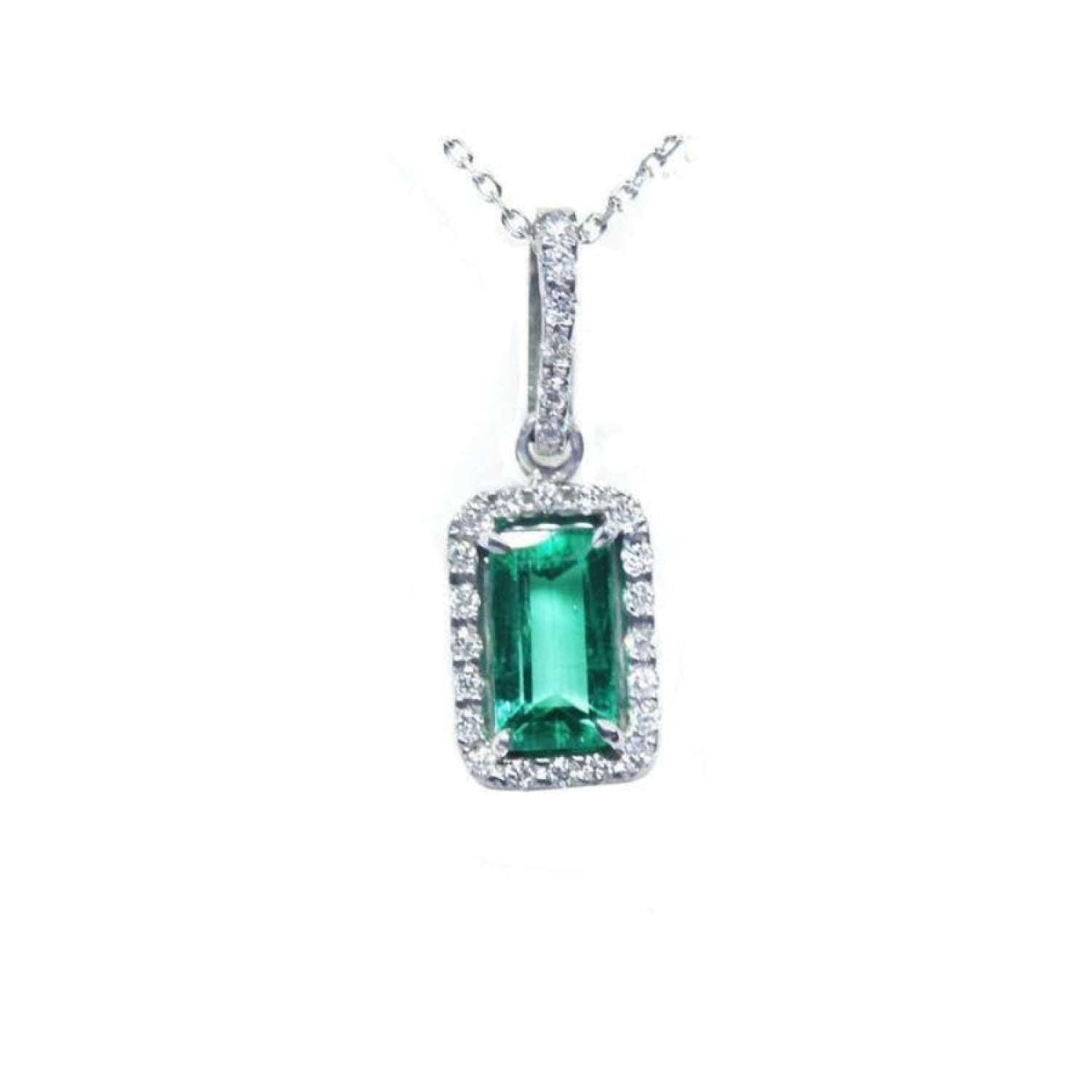 1.70 ct. Muzo Colombian emerald pendant with diamond halo in 18K white gold.