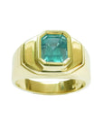 May birthstone emerald Muzo mine colombian emerald bezel set solitaire ring for men in yellow gold.