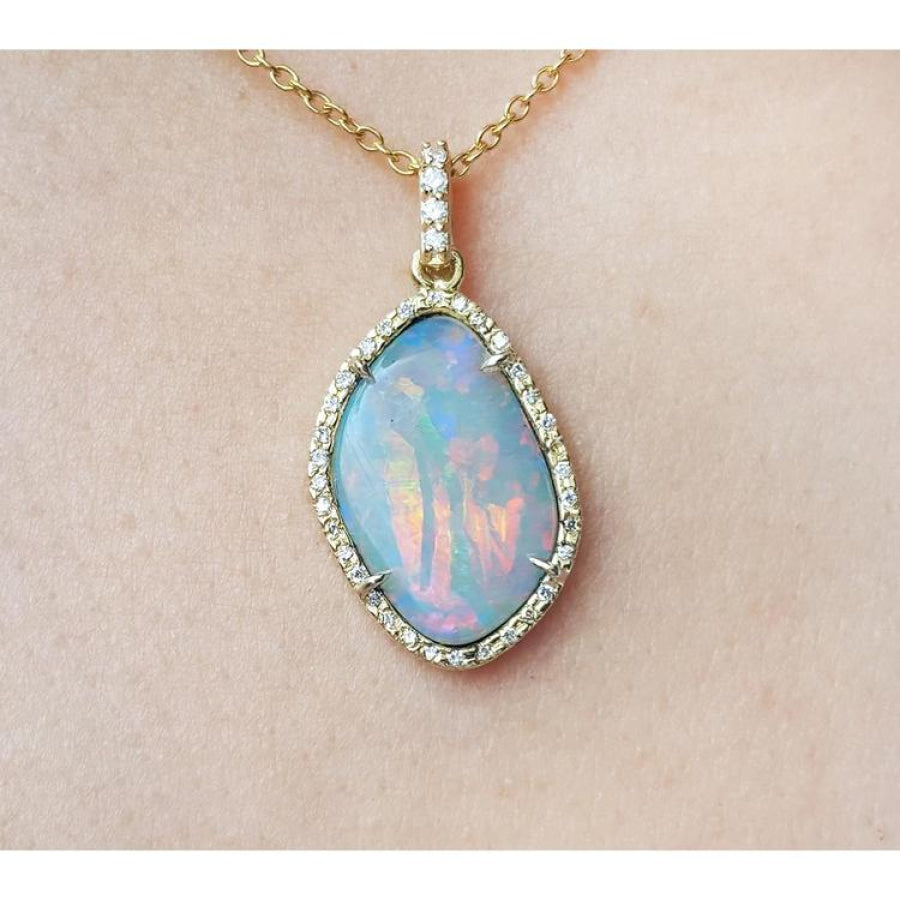 4.30 ct. natural Australian opal pendant with fiery red-orange play-of-color, halo diamonds, and 18K yellow gold chain.