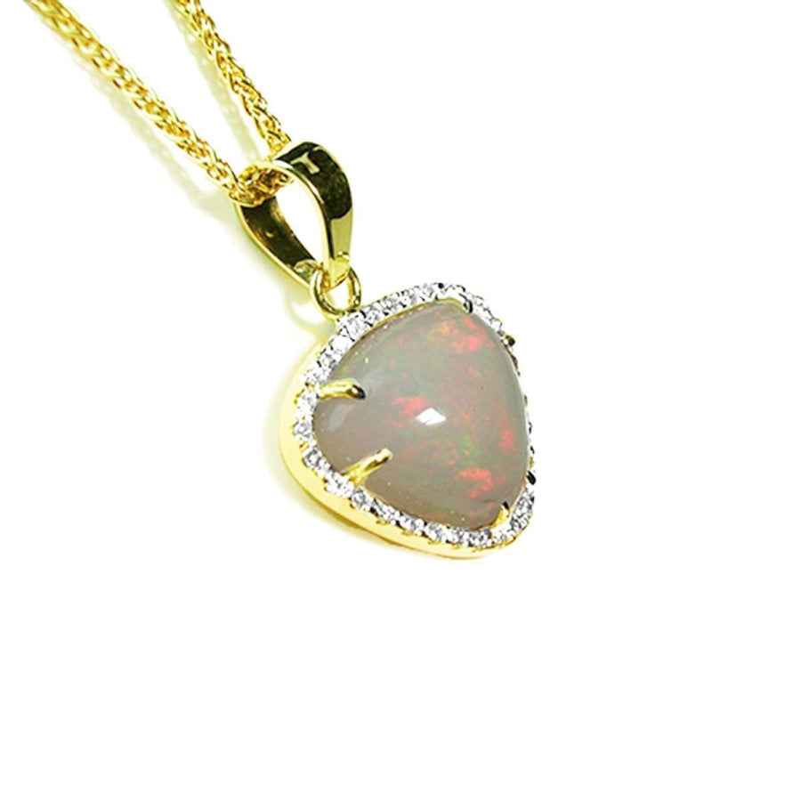 Natural Australian white opal pendant with red fire, diamond halo, and 14K yellow gold chain.