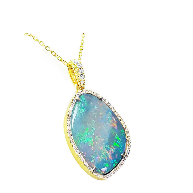 Natural and solid Australian opal jewelry collection, adorned with 
genuine diamonds and expertly crafted in solid 18k and 14k gold in the USA.