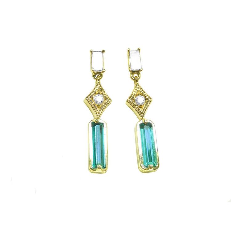 14k yellow gold earrings with baguette cut emeralds dangling from diamonds, front position top view.
