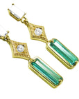 A pair of baguette cut emerald and diamond earrings, right side position top and gallery view.