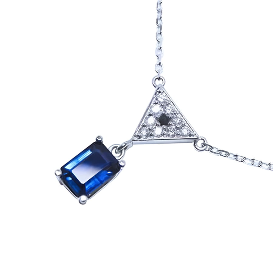 1.05 carat natural blue sapphire necklace with a trillion diamond centerpiece in 14K white gold.