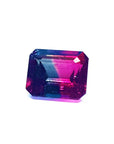 A faceted rectangular emerald cut watermelon tourmaline from Brazil displaying its left side profile top facets.