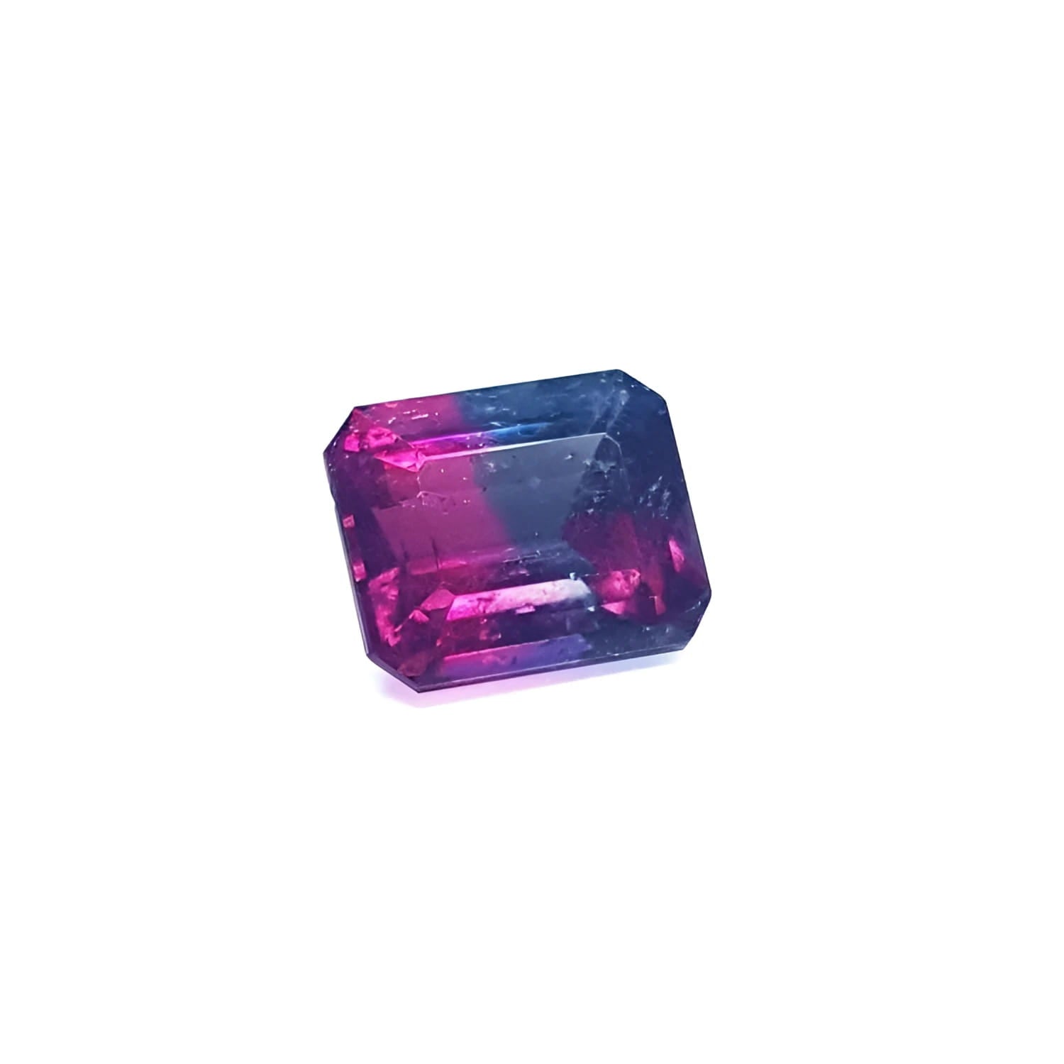Natural 3.55 ct. watermelon tourmaline gemstone with vibrant red, mint, and greenish-blue hues.