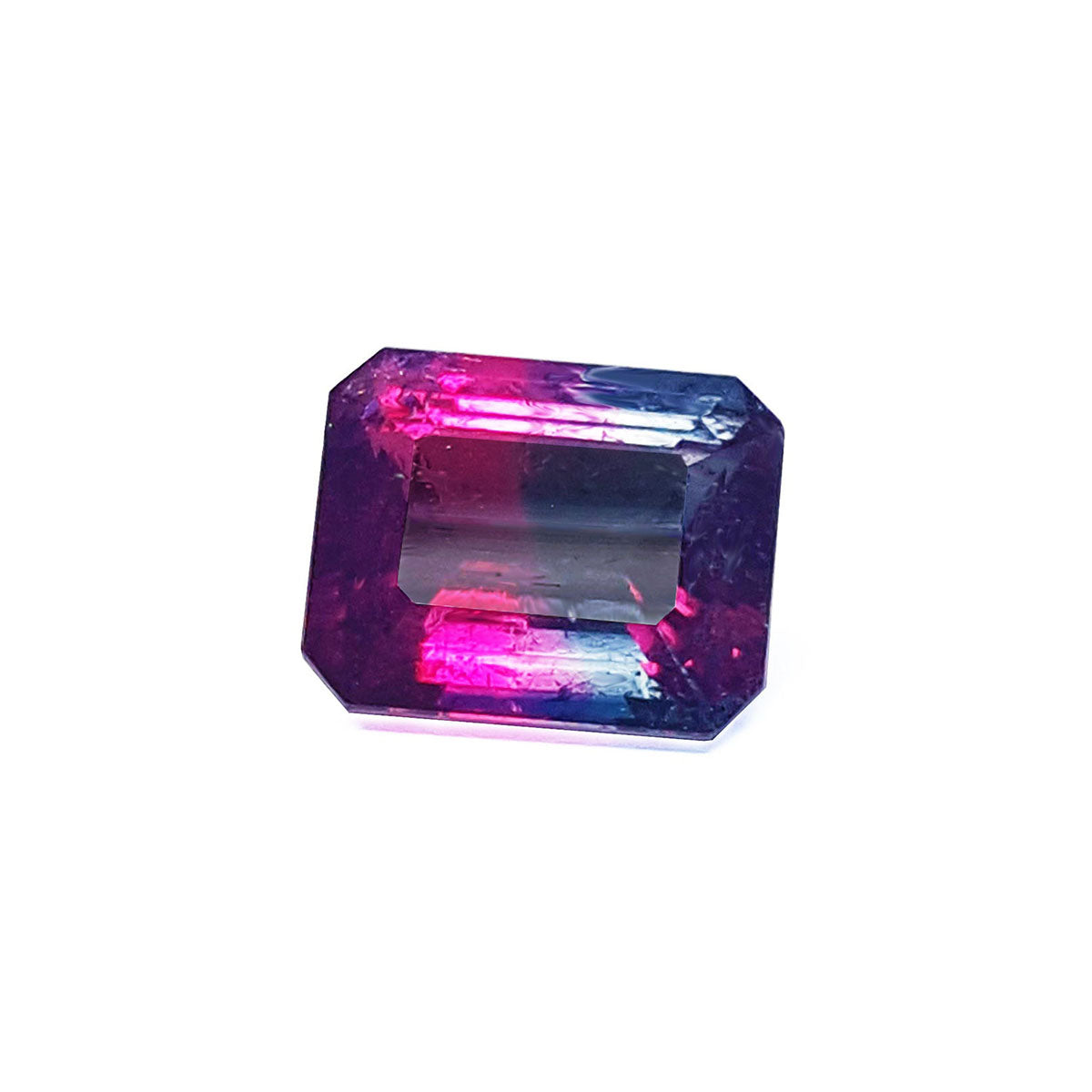 A topside position of this natural watermelon tourmaline displaying the table and crown facets.