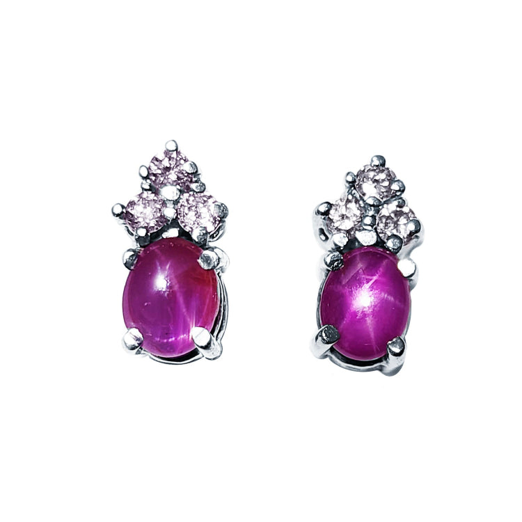 Natural star pink sapphire earrings cabochon and diamonds crafted in 14k white gold.