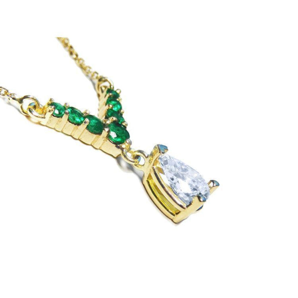 14K gold necklace with a 0.69 ct pear diamond and seven round emeralds in a V-shape.