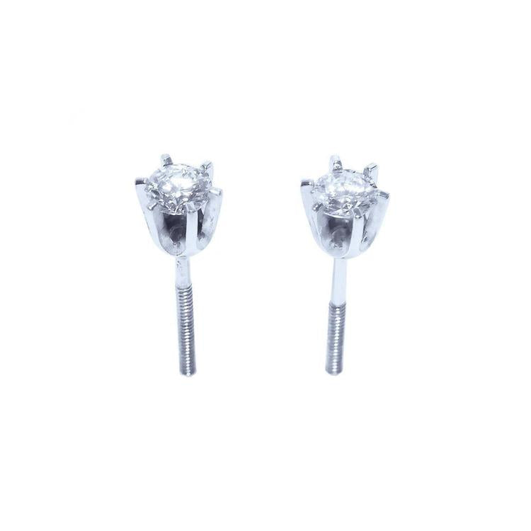 Pair of 14K white gold natural diamond stud earrings with six-prong settings and screw backs.