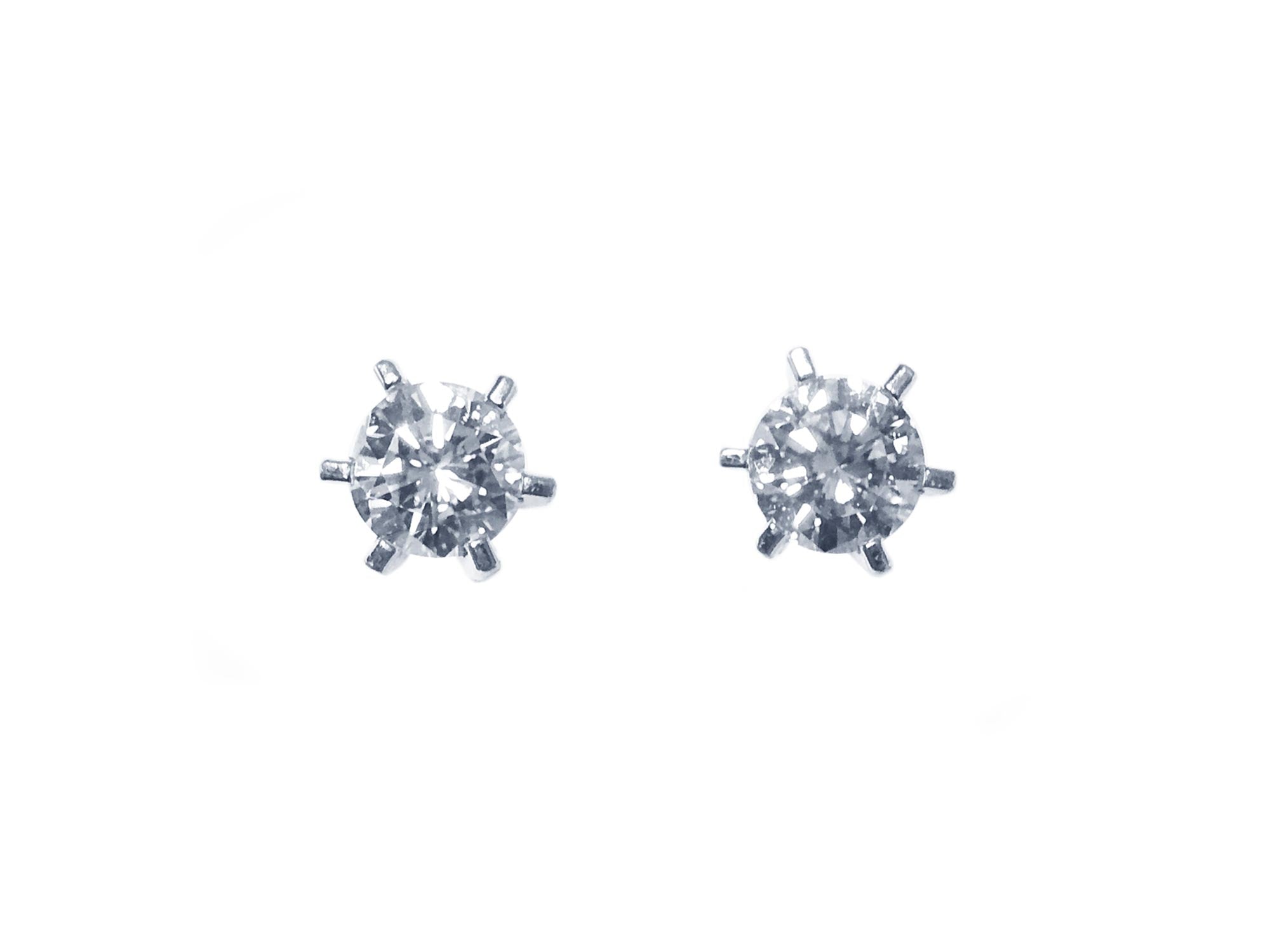 A pair of screw back natural diamond stud earrings white gold, topside position view.