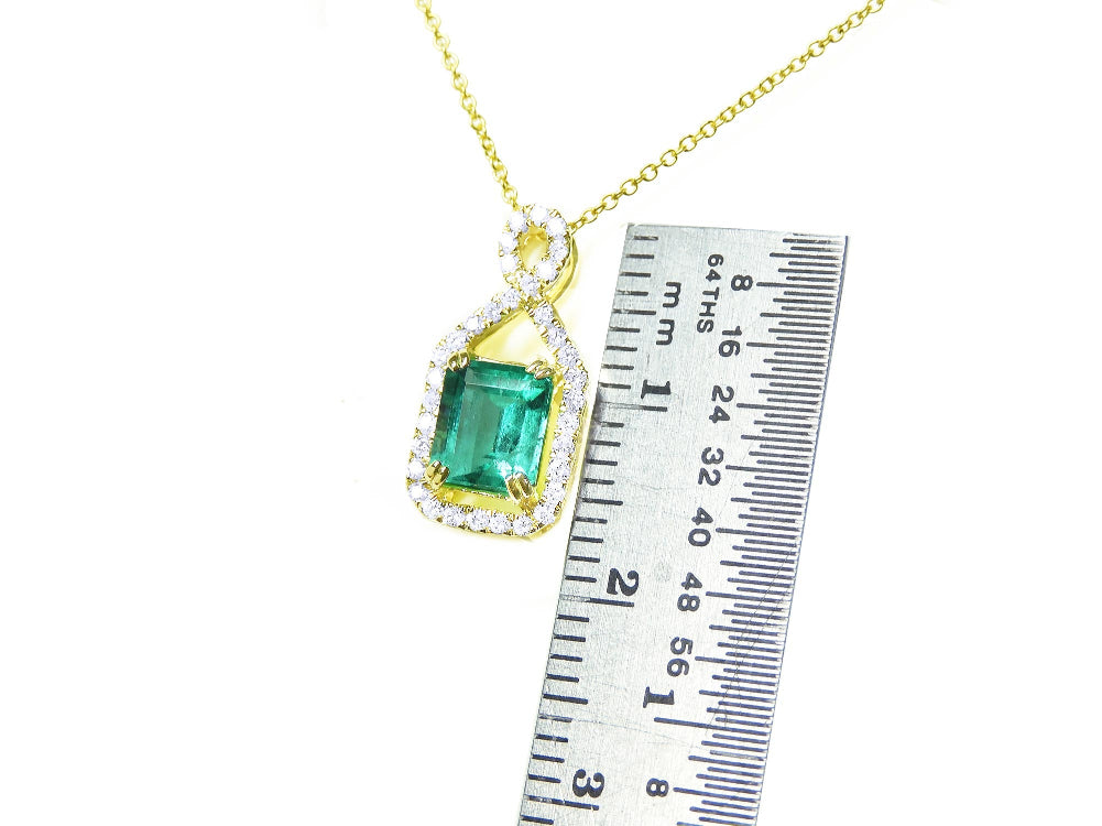 Genuine Colombian emerald necklace square emerald-cut sourced from the Muzo mine in Colombia, weighing 0.98 carats, halo diamond