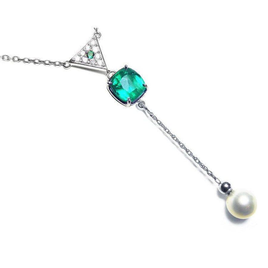 Cushion cut natural emerald necklace with freshwater pearl danglin, crafted in 14k white gold