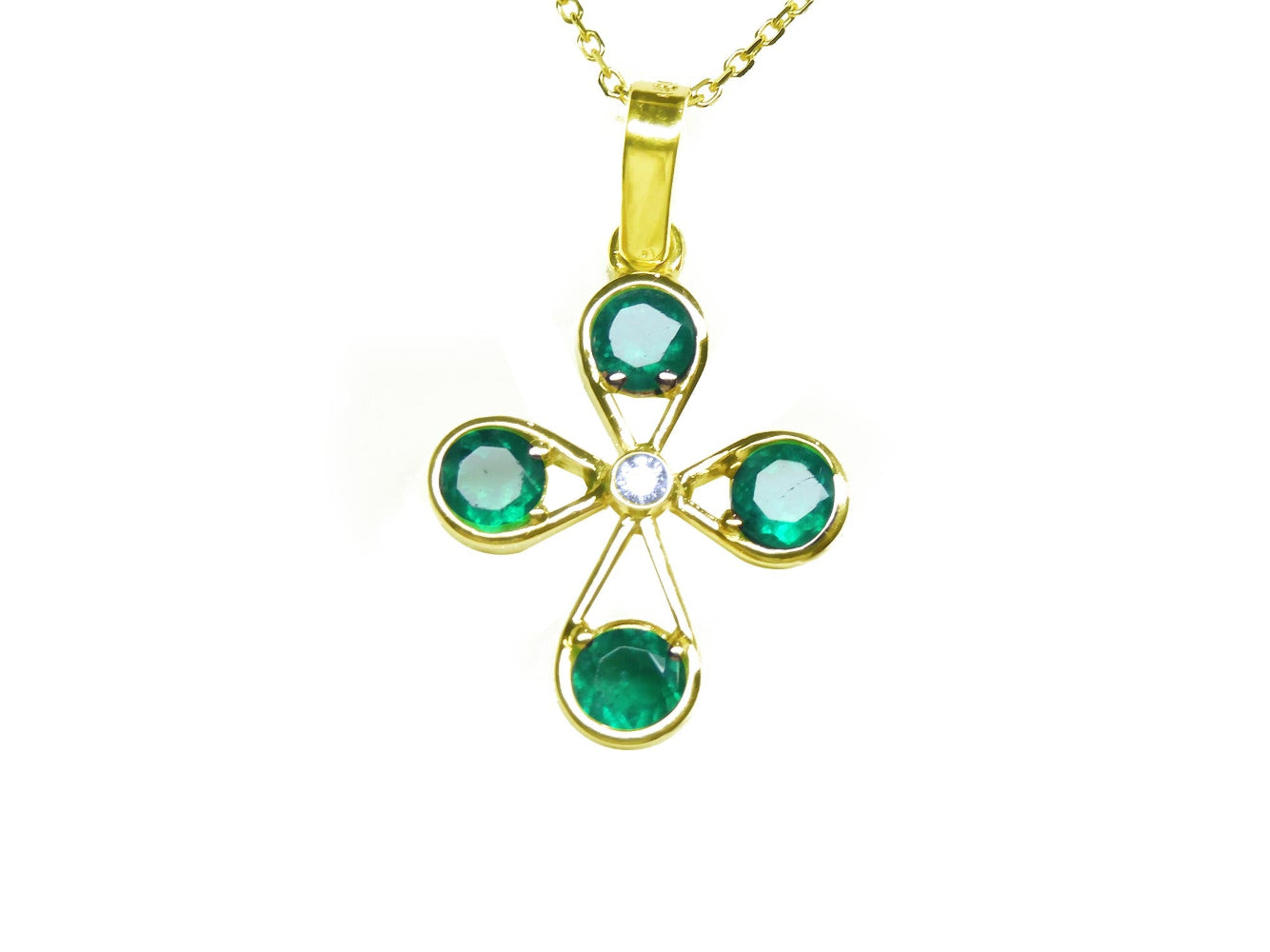A natural four stone emerald cross pendant in yellow gold topside view.