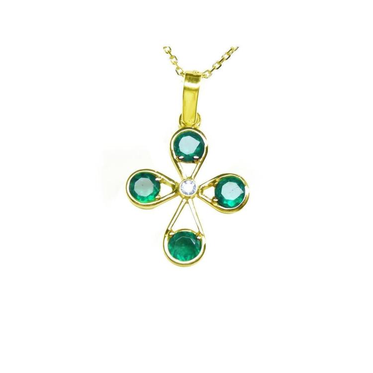 A natural four stone emerald cross pendant in yellow gold topside view.