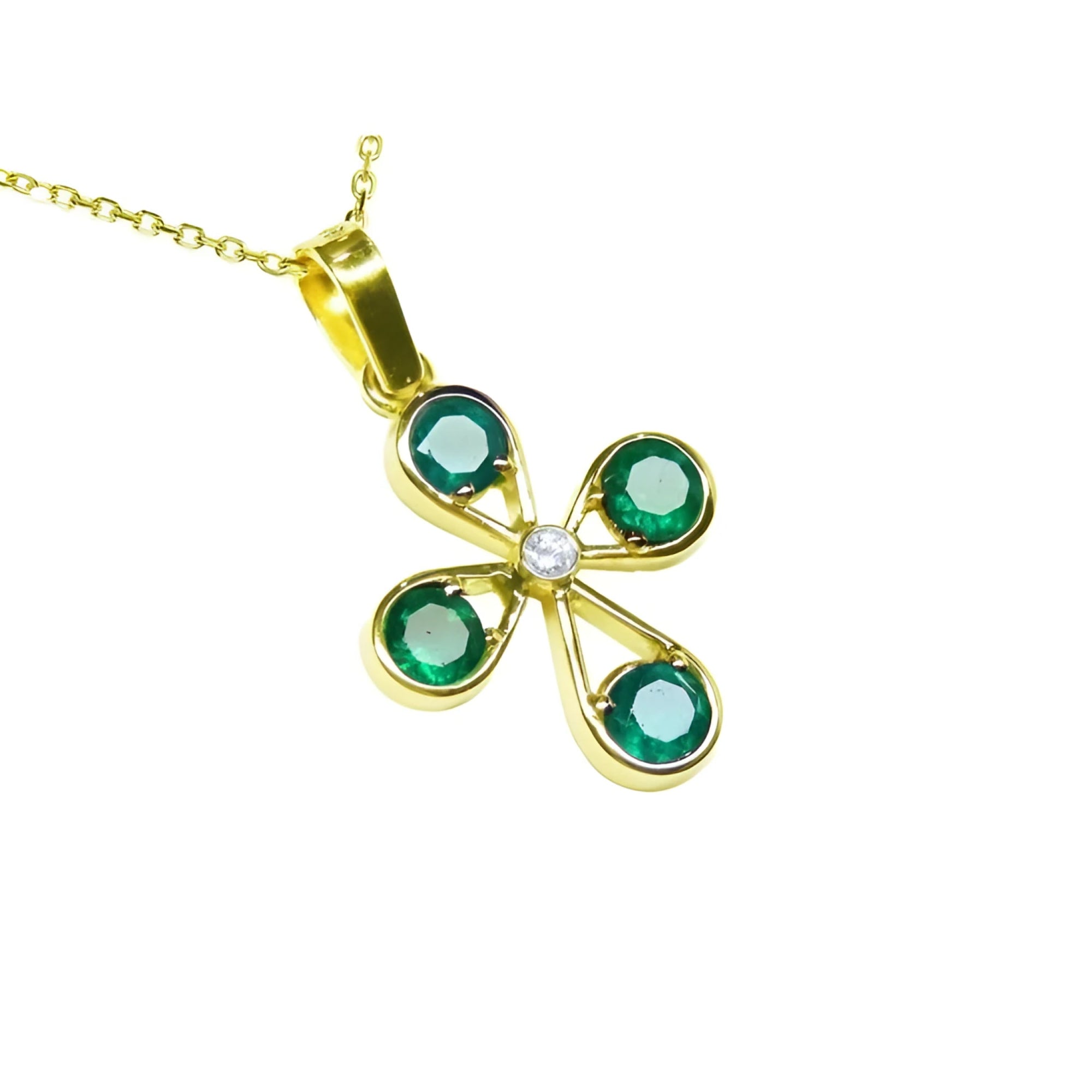 A colombian emerald cross pendant necklace four leaves handcrafted in 18k yellow gold displaying top and side profile.