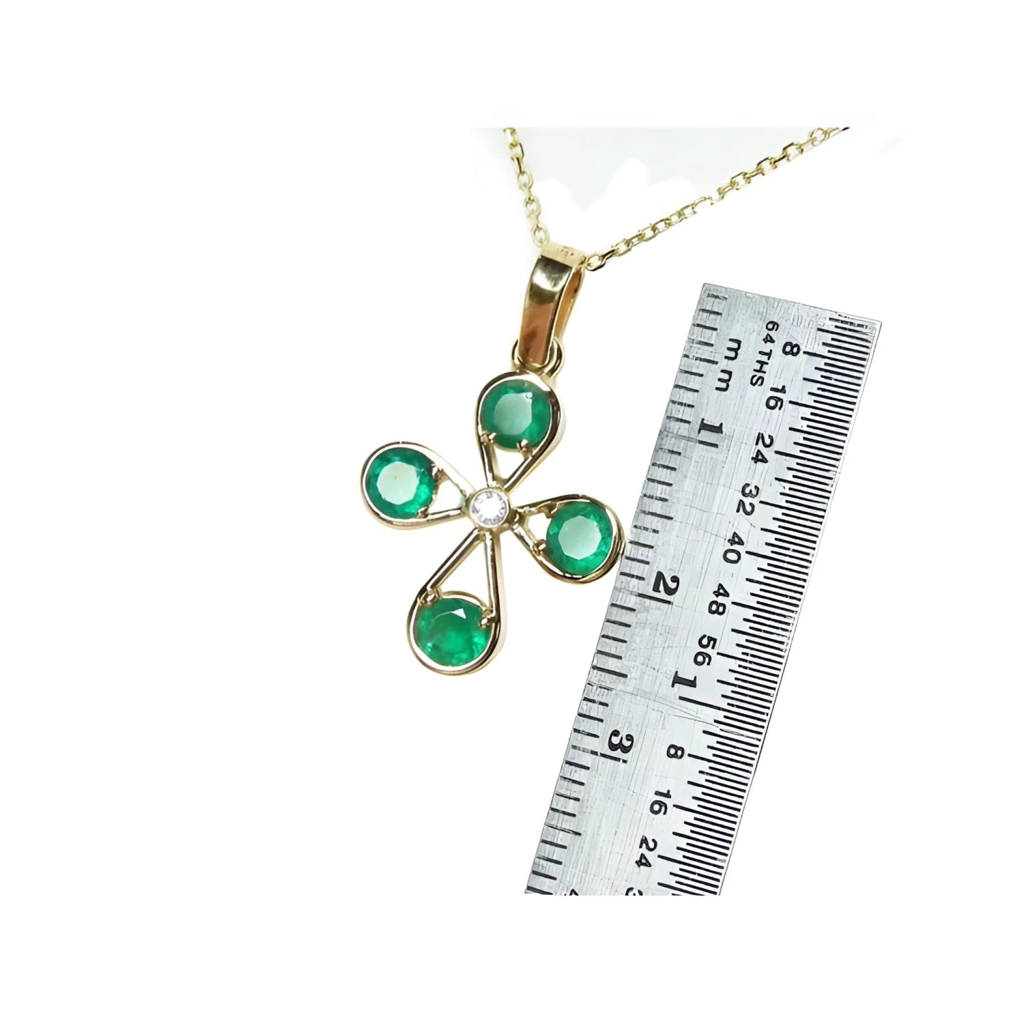 18K yellow gold cross pendant with four round natural Colombian emeralds and a central diamond.