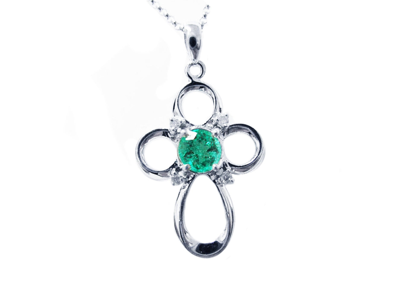 A 14k white gold emerald cross pendant necklace, displaying the topside view.