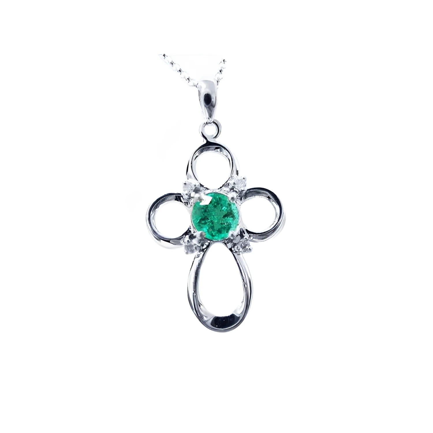 A 14k white gold emerald cross pendant necklace, displaying the topside view.
