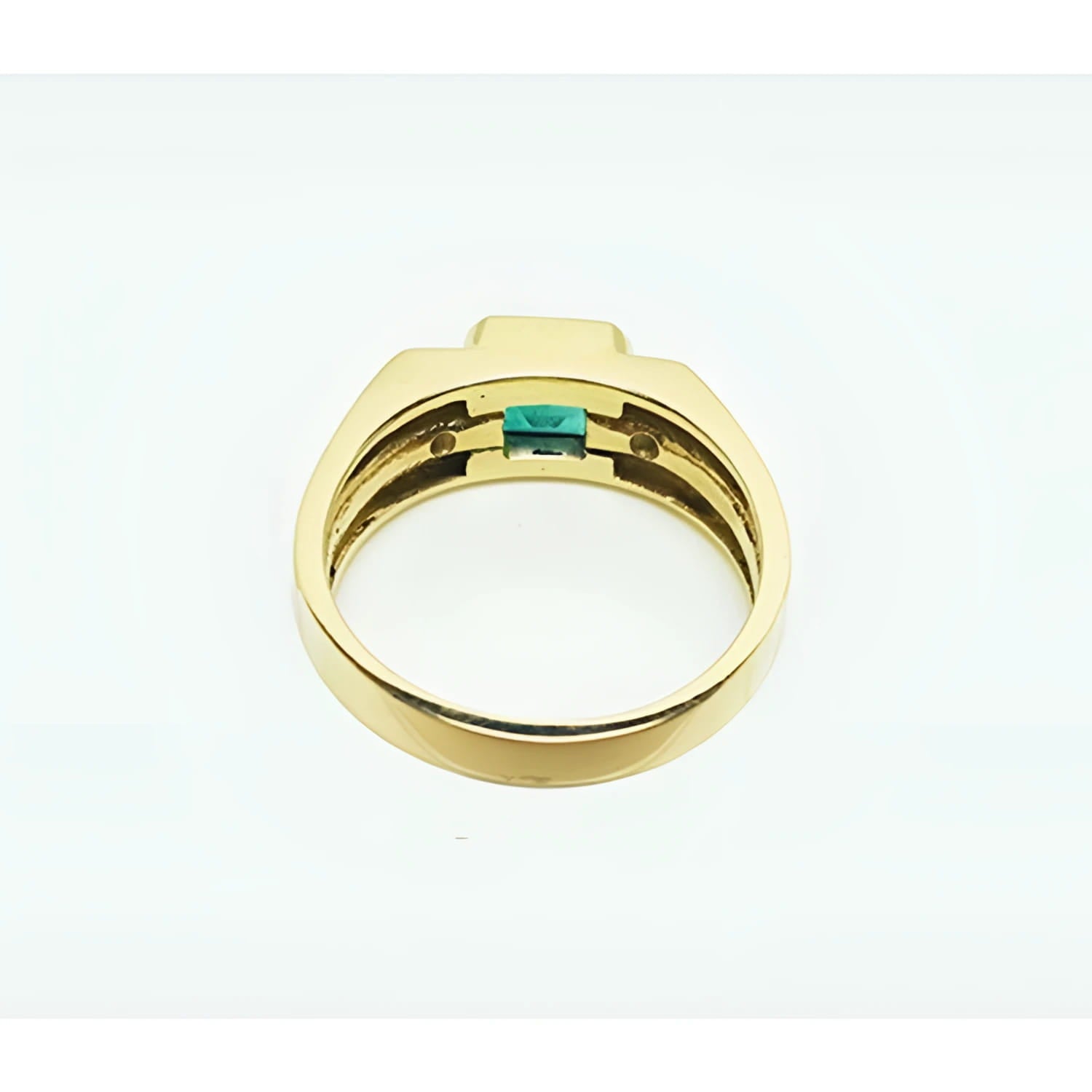 Men's 14K yellow gold ring with a bezel-set natural emerald and side diamonds.