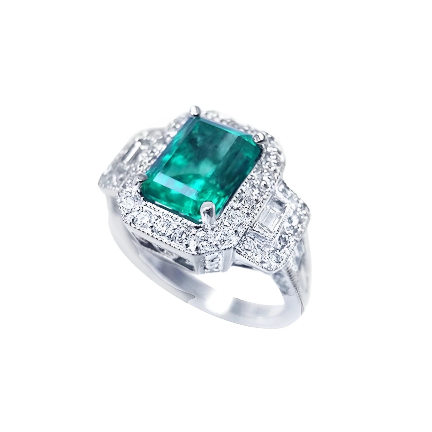 Vibrant 2.47 ct emerald engagement ring in 18K white gold with diamond halo and baguette side diamonds.