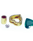 Gold mounting on the rough with heart cut emerald and diamond to be set.
