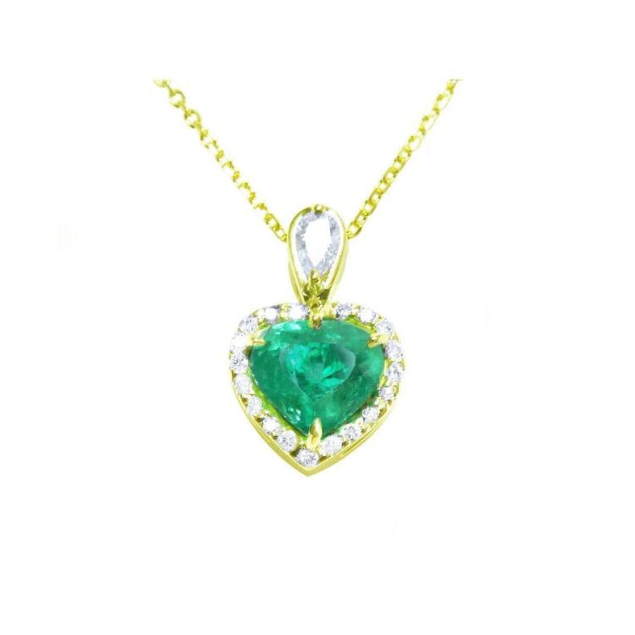 14K yellow gold heart pendant with a medium-deep green emerald and diamond halo on a delicate chain.