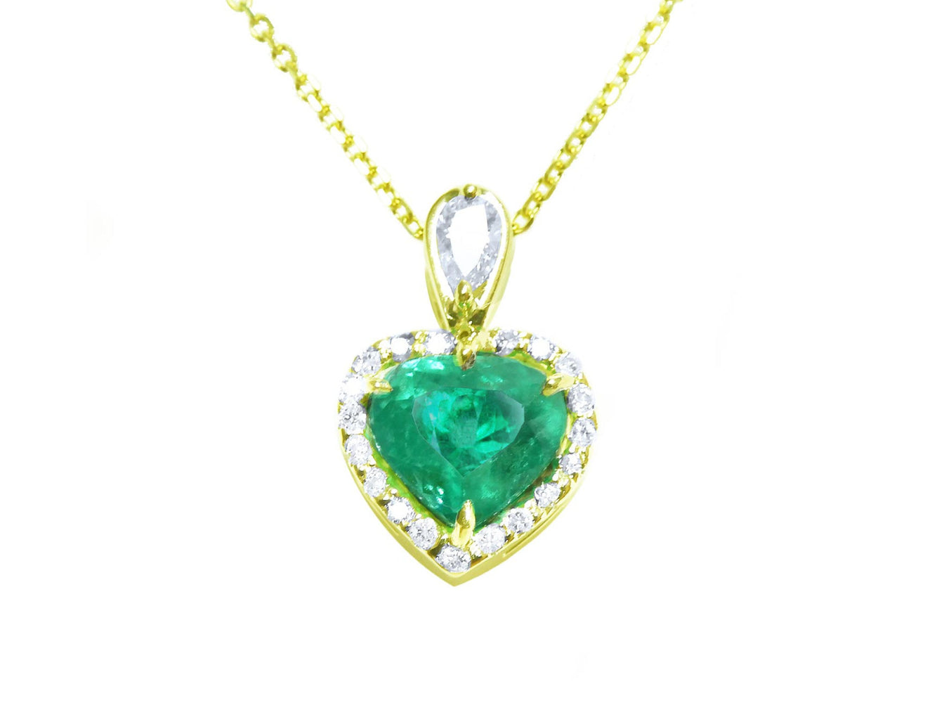 Heart-shaped emerald pendant with gold and diamonds frame on a white background.