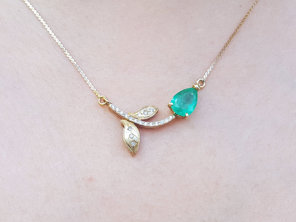 Real Emerald necklace for women 1.66 carats sourced from Muzo mines; nature inspired design handcrafted in 14k yellow gold